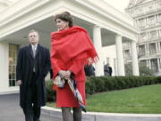 FILE - House Speaker Nancy Pelosi of Calif., right, and Senate Majority Whip Richard Durbin of Ill., walk out of the West Wing of the White House in Washington, Jan. 10, 2007, toward reporters following a meeting with President Bush to discuss his revised Iraq strategy.