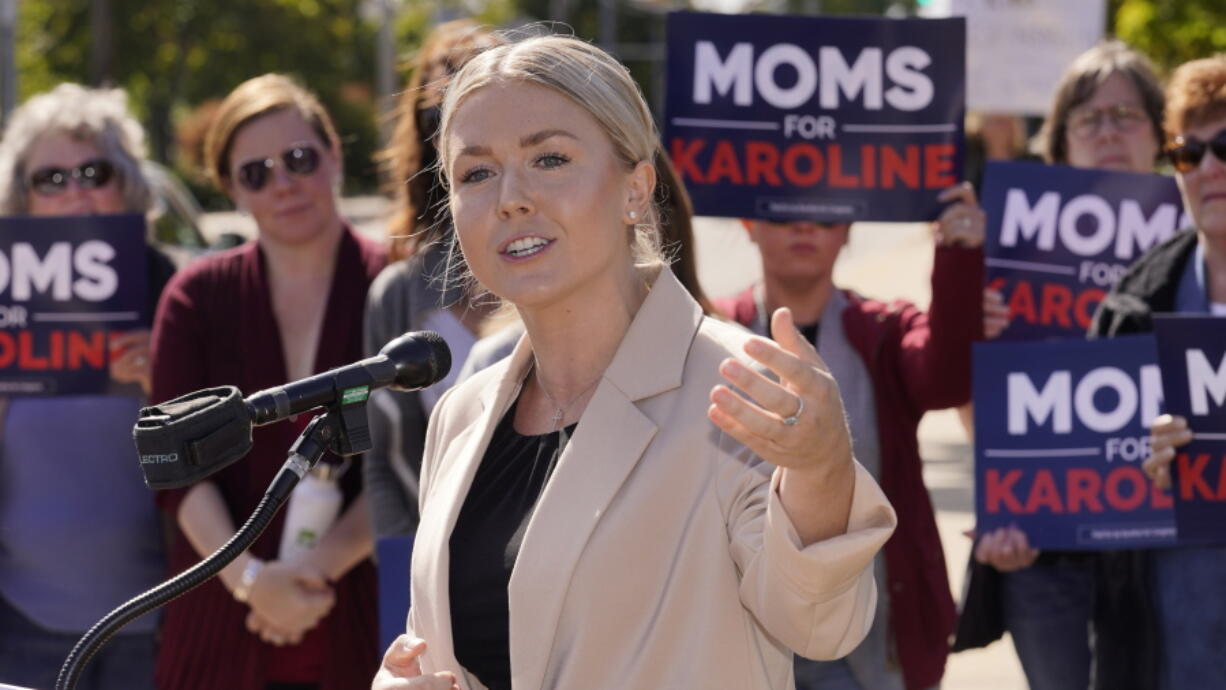 FILE - New Hampshire Republican 1st Congressional District candidate Karoline Leavitt at a campaign event, Sept. 29, 2022, in Manchester, N.H. The House GOP's Class of 2022 midterm candidates includes a distinct group -- a new generation of political outsiders, populists and some extremists. They would bring an untested and potentially unruly majority if Republicans win the House in the Nov. 8 election.