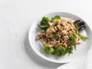 This image released by Milk Street shows a recipe for Chicken and Bean Salad with Pepper Jelly Vinaigrette.