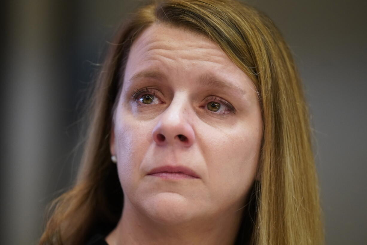 Gabby Petito's mother Nichole Schmidt, looks on during a news conference Thursday, Nov. 3, 2022, in Salt Lake City. Gabby Petito's family filed a wrongful death lawsuit alleging that police failed to recognize their daughter was in a life-threatening situation last year when officers investigated a fight between her and her boyfriend. The fight happened weeks before authorities say the boyfriend killed her while the couple was on a cross-country van trip.