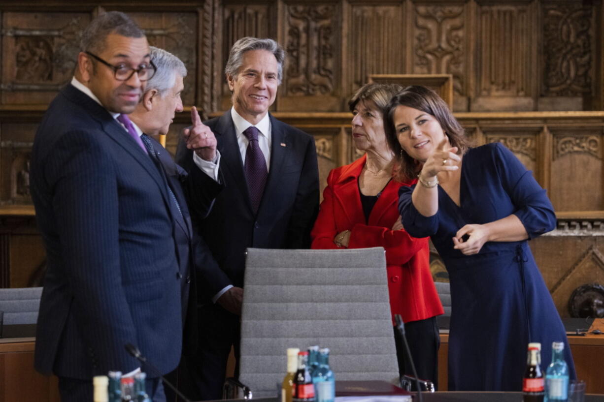 From left, Great Britain's Foreign Minister James Cleverly, Italy's Foreign Minister Antonio Tajani, Secretary of State of the United States, Antony Blinken, Catherine Colonna, Foreign Minister of France, and German Foreign Minister Annalena Baerbock talk at the Historic Town Hall during the G7 Foreign Ministers Meeting in Muenster, Germany, Friday, Nov. 4, 2022.