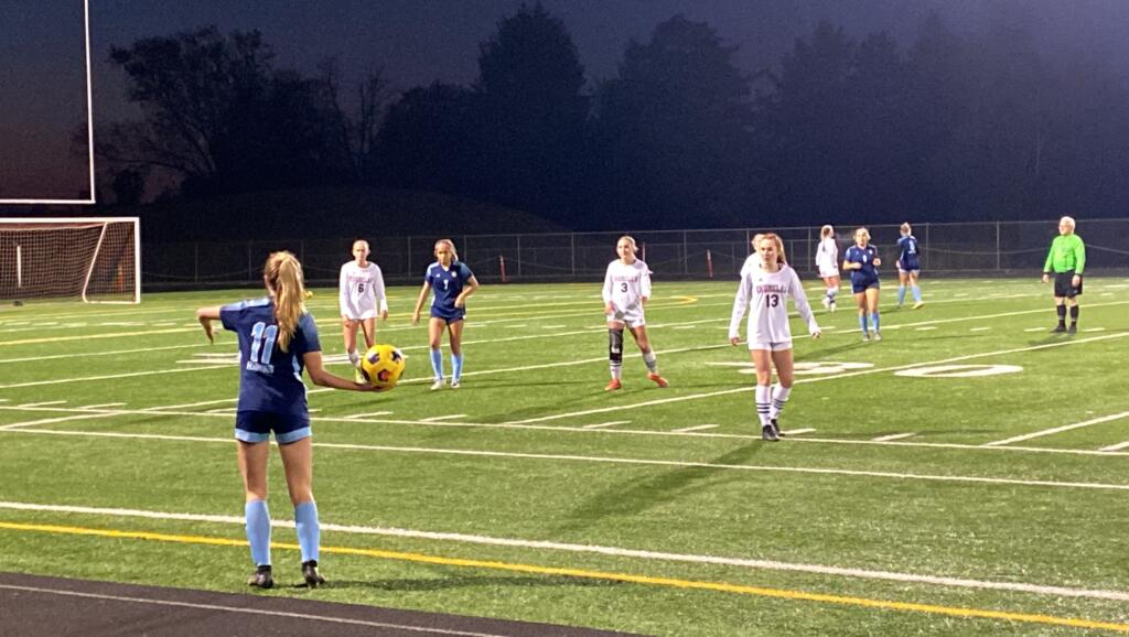 Hockinson's Ani Vossler prepares to throw the ball in during the second half of Saturday's 2A girls soccer state quarterfinal at District Stadium in Battle Ground.