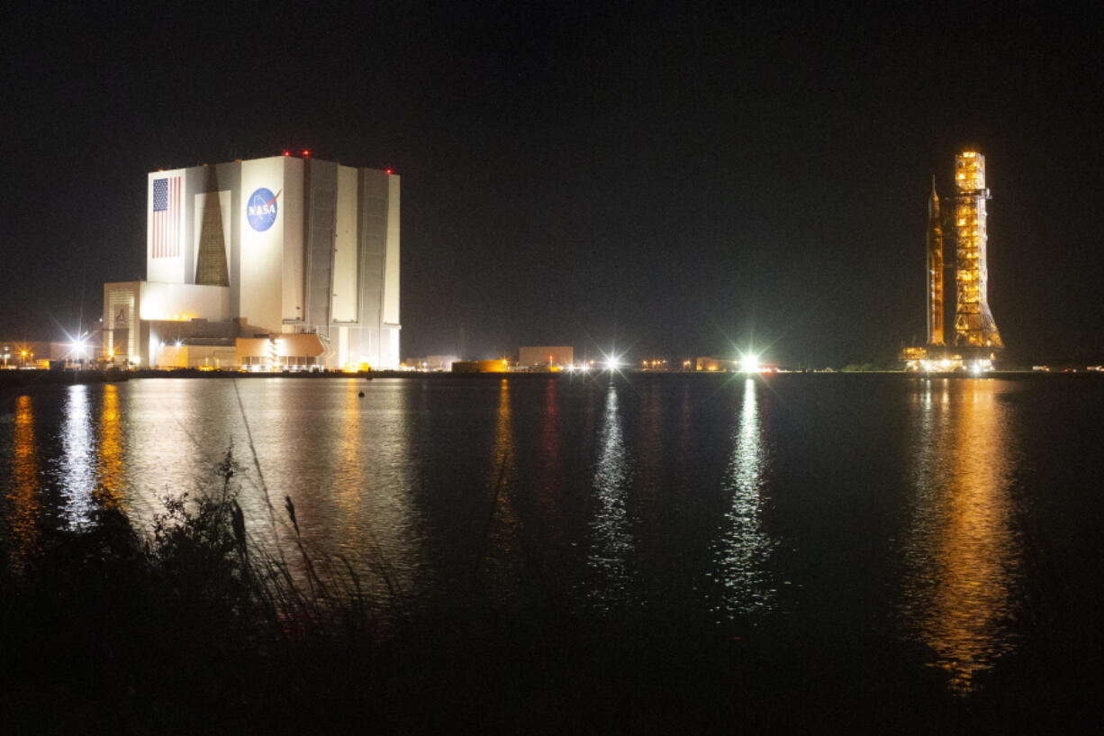 NASA's Space Launch System (SLS) rocket with the Orion spacecraft aboard is seen atop the mobile launcher as it rolls out to Launch Pad 39B, Friday, Nov. 4, 2022, at NASA's Kennedy Space Center in Florida.