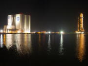 NASA's Space Launch System (SLS) rocket with the Orion spacecraft aboard is seen atop the mobile launcher as it rolls out to Launch Pad 39B, Friday, Nov. 4, 2022, at NASA's Kennedy Space Center in Florida.