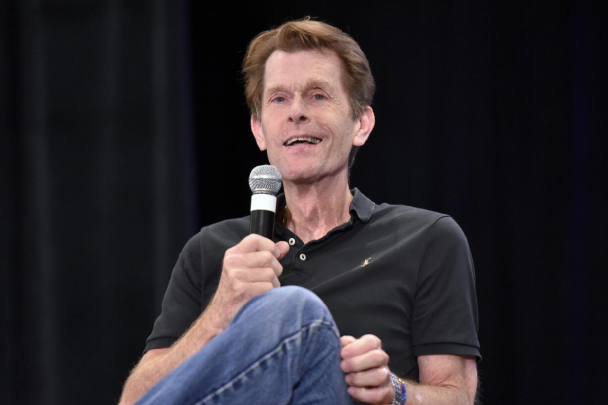 FILE - Kevin Conroy participates during a Q&A panel at Wizard World on Aug. 24, 2019, in Chicago. Conroy, the prolific voice actor whose gravely voice on the "Batman: The Animated Series" was for many Batman fans the definite sound of the Caped Crusader, died Thursday after a battle with cancer. He was 66. Warner Bros., which produced the series, announced Friday.