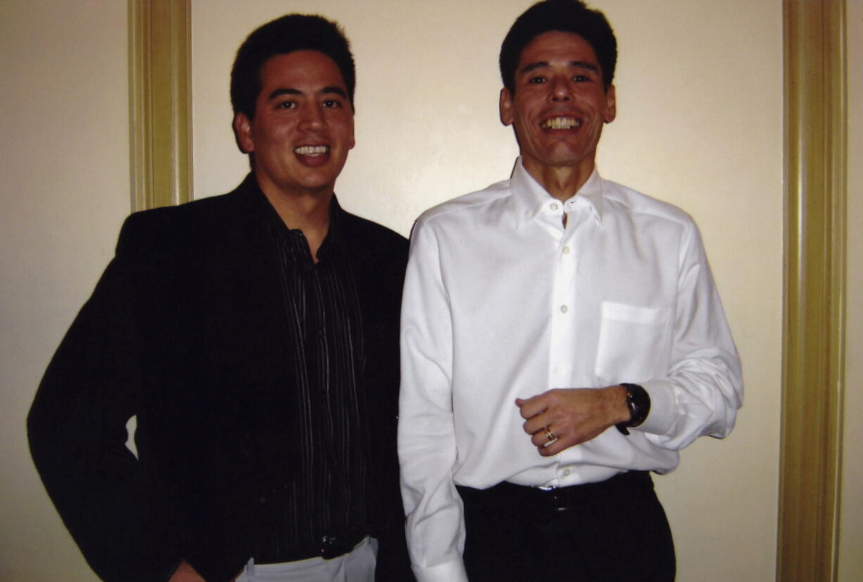 This undated photo shows from left, Craig Yabuki and his brother Jeff Yabuki.