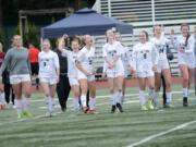 The members of the Seton Catholic girls soccer team celebrate after their 4-1 win over La Center during the 1A girls soccer district third-place match at King's Way Christian High School on Saturday, Nov. 5, 2022.