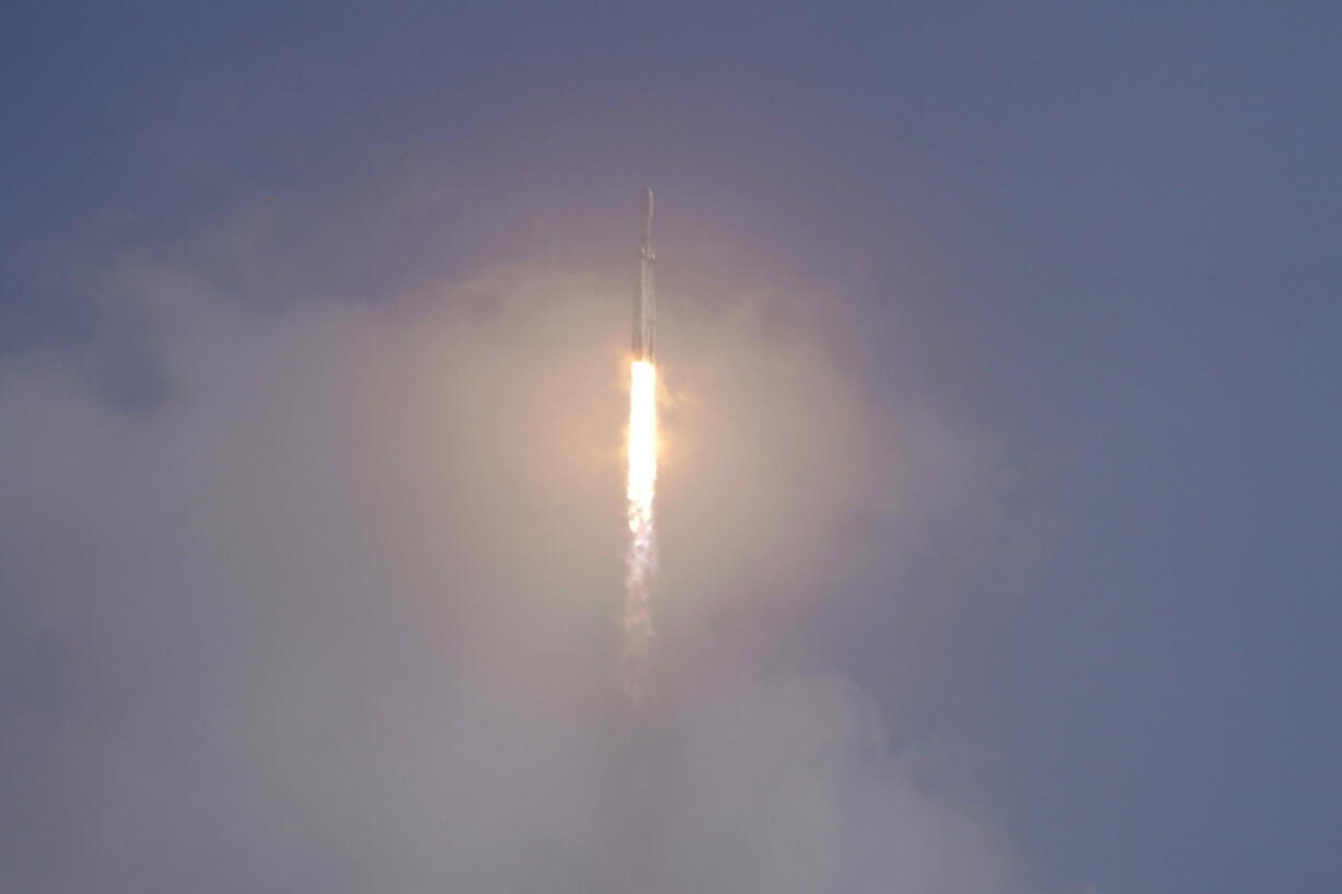 A SpaceX Falcon Heavy rocket lifts off from pad 39A at the Kennedy Space Center in Cape Canaveral, Fla., Tuesday, Nov. 1, 2022.