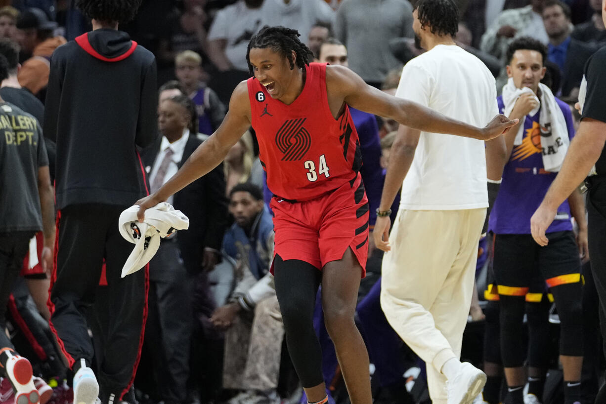 Portland Trail Blazers forward Jabari Walker (34) reacts after an NBA basketball game against the Phoenix Suns, Friday, Nov. 4, 2022, in Phoenix.