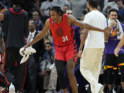 Portland Trail Blazers forward Jabari Walker (34) reacts after an NBA basketball game against the Phoenix Suns, Friday, Nov. 4, 2022, in Phoenix.