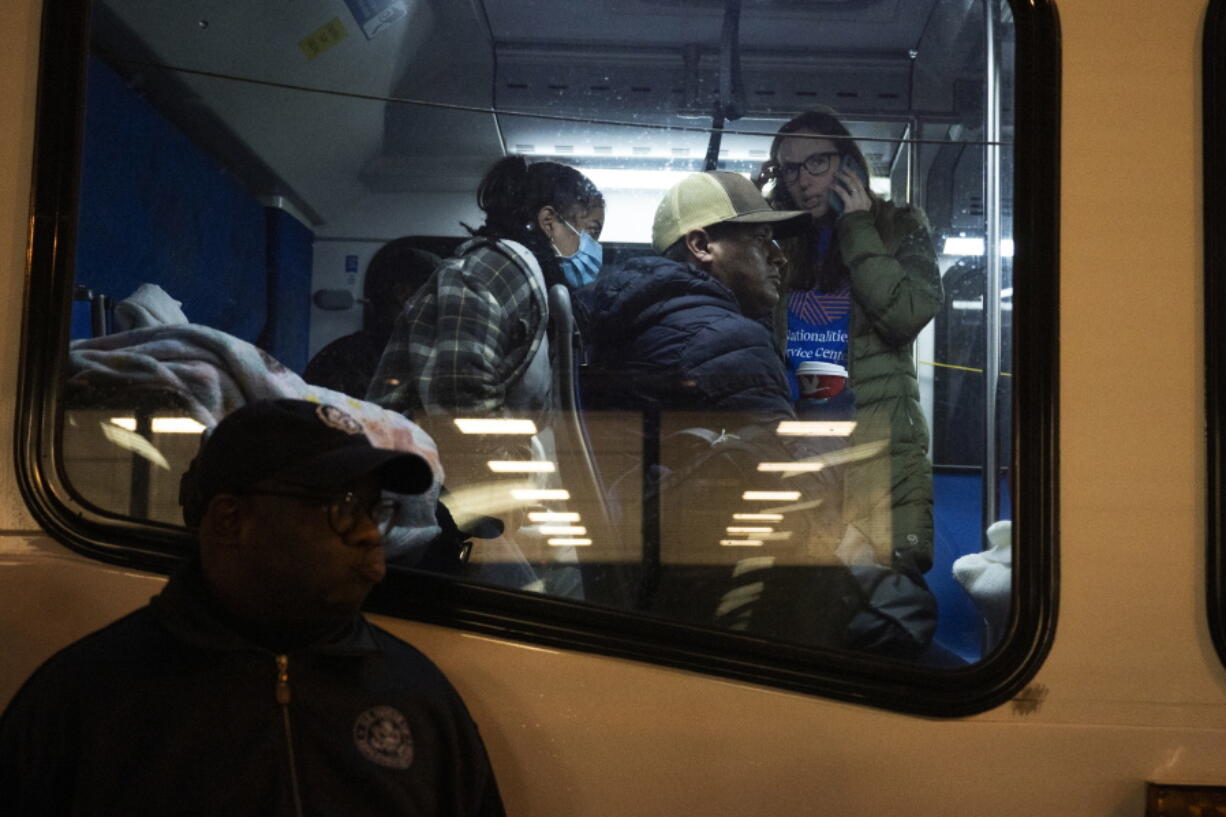 Migrants sent by Texas Gov. Greg Abbott arrive near 30th Street Station Wednesday morning, Nov. 16, 2022, in Philadelphia.