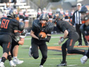 Washougal's Liam Atkin runs with the ball during the Panthers' 38-34 over Shelton in a 2A district playoff in Washougal on Saturday, Nov. 5, 2022.