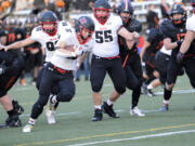 Shelton's Bradley Eleton races toward the end zone to score the first of his five touchdowns in Shelton's 38-34 loss to Washougal in a 2A district playoff at Washougal on Saturday, Nov. 5, 2022. Shelton, reclassified to Class 3A in January, will join the 3A GSHL for football beginning in 2024.
