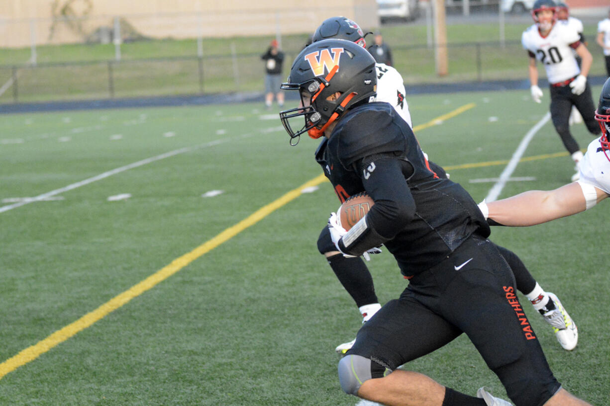 Washougal's John Costa heads downfield after making a catch during the Panthers' 38-34 win over Shelton in a 2A district playoff in Washougal on Saturday, Nov. 5, 2022.