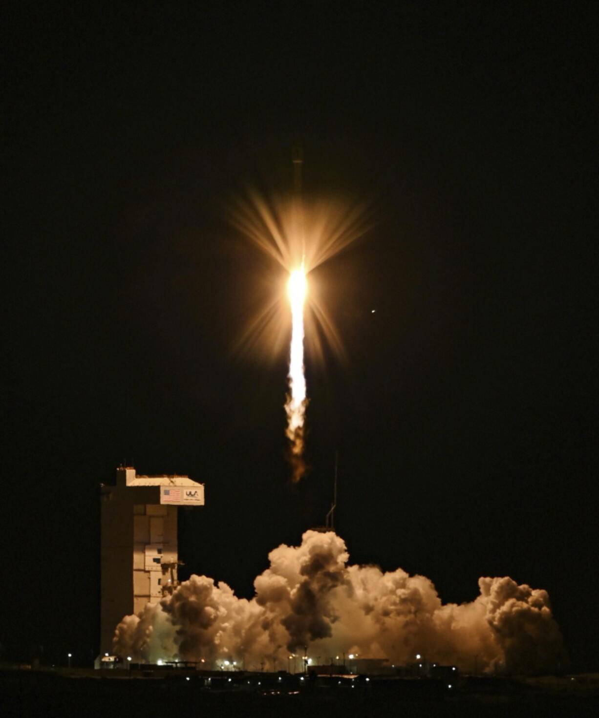 A United Launch Alliance Atlas V rocket carrying the Joint Polar Satellite System-2 satellite and the NASA test payload lifts off from Vandenberg Space Force Base, Calif., on Thursday. The satellite is intended to improve weather forecasting and an experimental inflatable heat shield to protect spacecraft entering atmospheres. (Ryan Quijas/U.S.