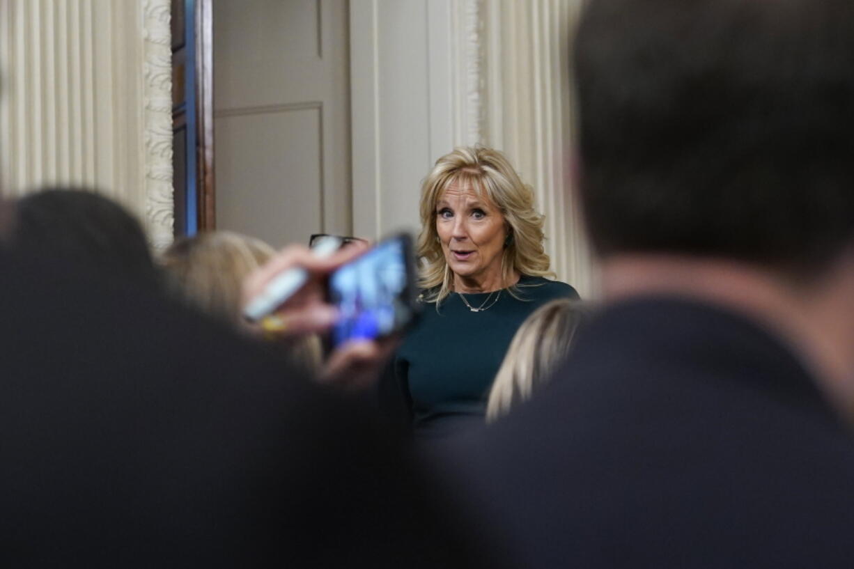 FILE - First lady Jill Biden arrives before President Joe Biden for a news conference in the State Dining Room of the White House in Washington, Nov. 9, 2022. Biden will host a Veterans Day breakfast at the White House on Friday morning as she announces new support for children who live with wounded service members and veterans.