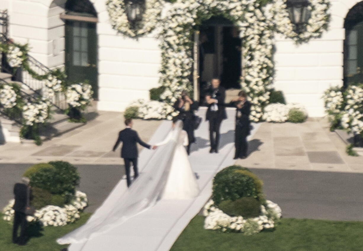 President Joe Biden's granddaughter Naomi Biden and her fiance, Peter Neal, are married on the South Lawn of the White House in Washington, Saturday, Nov. 19, 2022.