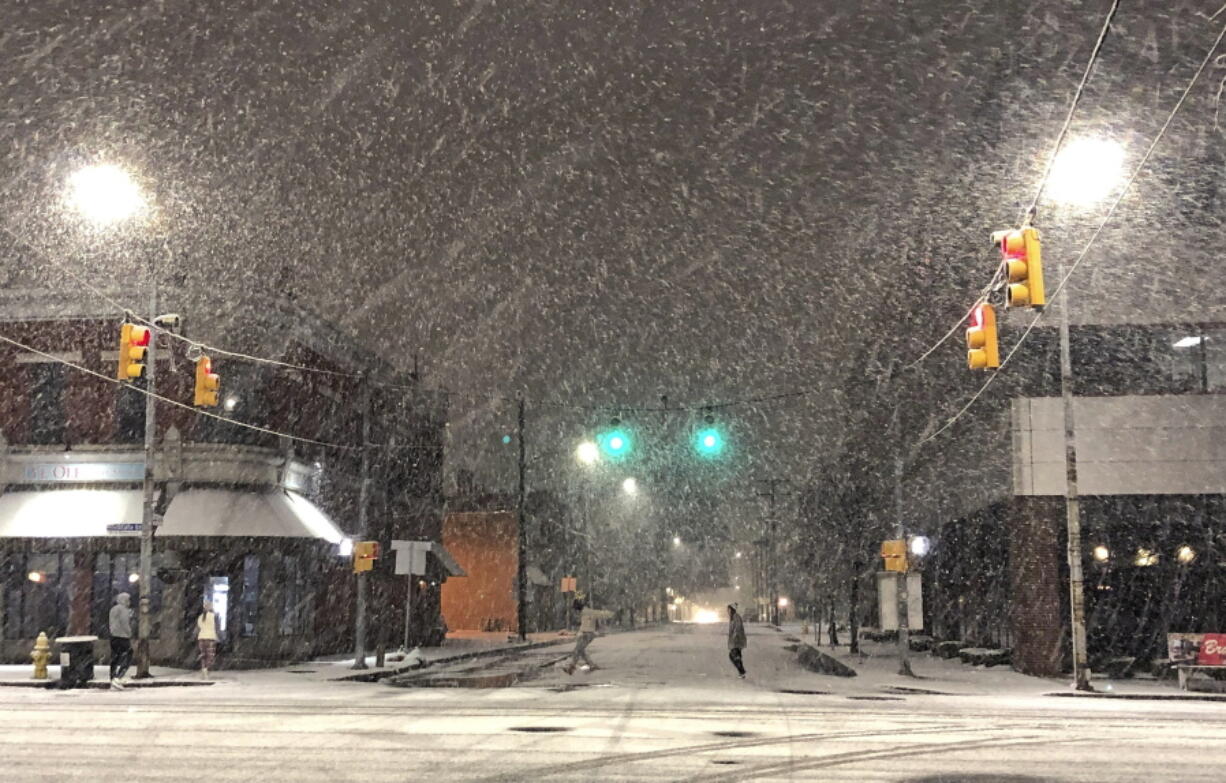 Heavy snow falls on Wednesday, Nov. 16, 2022 in Erie, Pa. as the first lake-effect storm hits the Erie region.