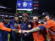 Houston Astross relief pitcher Rafael Montero, relief pitcher Bryan Abreu, starting pitcher Cristian Javier, catcher Christian Vazquez, and relief pitcher Ryan Pressly, from left, celebrate a combined no hitter after Game 4 of baseball's World Series between the Houston Astros and the Philadelphia Phillies on Wednesday, Nov. 2, 2022, in Philadelphia. The Astros won 5-0 to tie the series two games all.