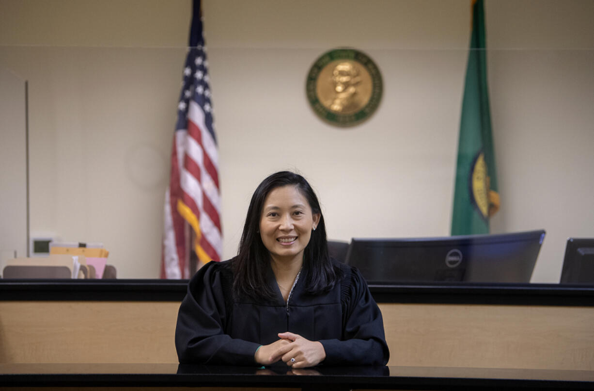 The newest Clark County Superior Court judge, Tsering Cornell, poses for a portrait in her Vancouver courtroom. As the daughter of two Tibetan immigrants, Cornell remains connected with local Tibetan groups. The community celebrated her judicial appointment, which it says makes her the first Tibetan American judge in the United States.