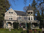 Blue skies hang above Marshall House on Officers Row at the Fort Vancouver National Historic Site. The Queen Anne home stands out from the other buildings lining the street. Holly Chamberlain, historic preservation director, said the Marshall House deviated from standard Army buildings with its additional flair.