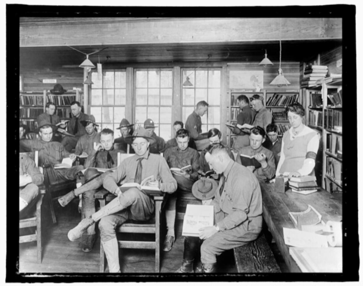 The YMCA Library hut at the Vancouver Barracks between 1917 and 1920. The tent was part of the American Library Association's Library War Service effort to improve the reading level of recruits headed to fight in France. The ALA and the YMCA collected books, sending 2.5 million overseas. The organizations also provided books for 651 military bases and 998 YMCA huts.