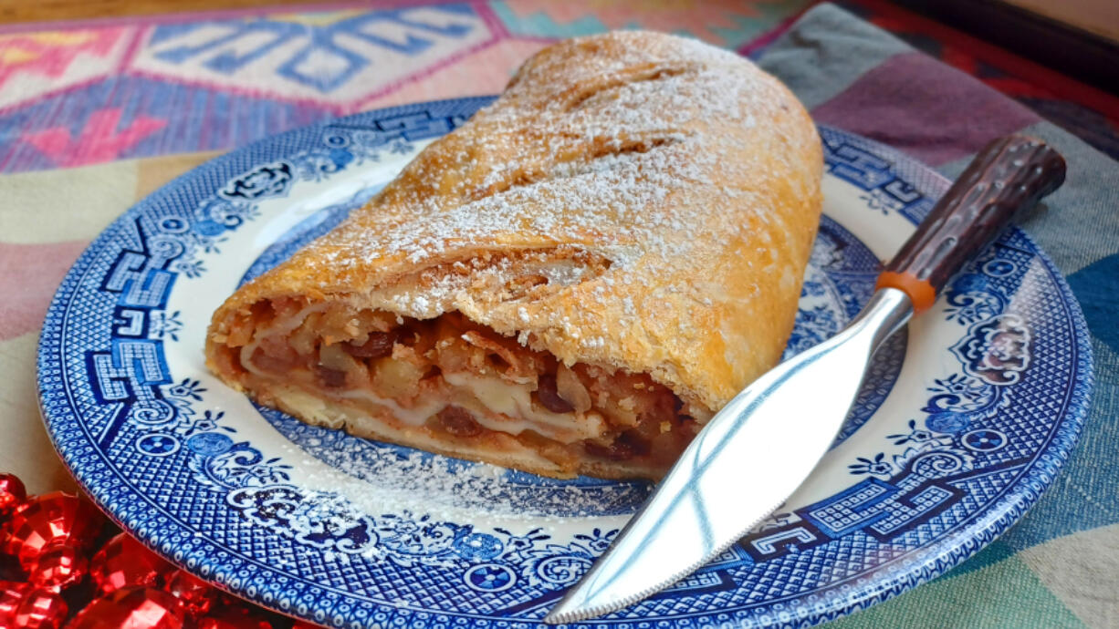 This classic dessert is just right for the holidays with cinnamon-laced apples and raisins enveloped in buttery pastry.