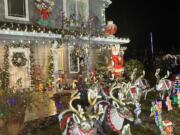 This year Jim Mains and his crew of two hung more than 150,000 Christmas lights on Franklin Street in Vancouver.