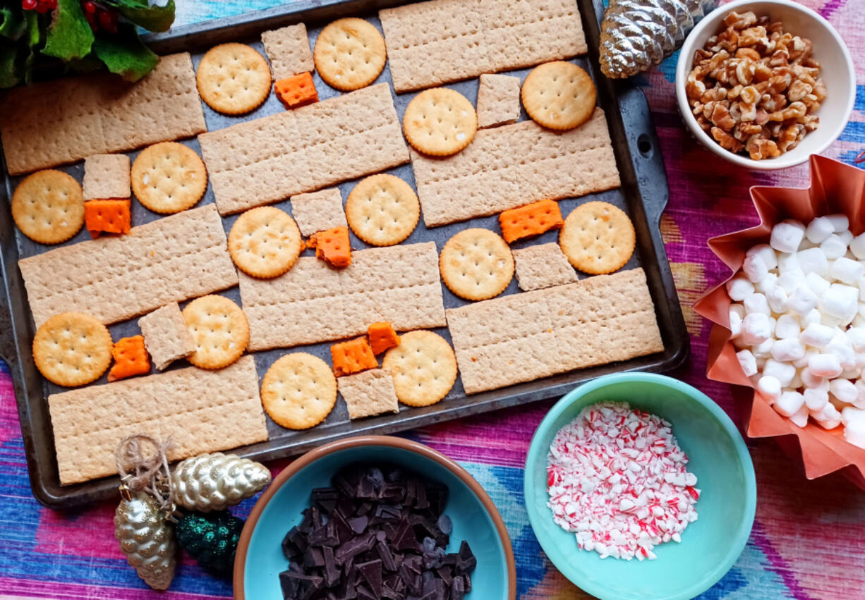 Use up crackers and other goodies left over from holiday gatherings to make this festive Christmas Cracker toffee.