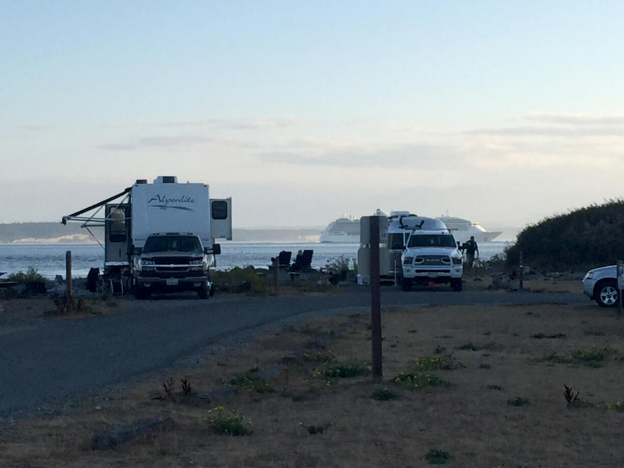 An Alaska-bound cruise ship passes the campground at Fort Casey State Park on Whidbey Island.