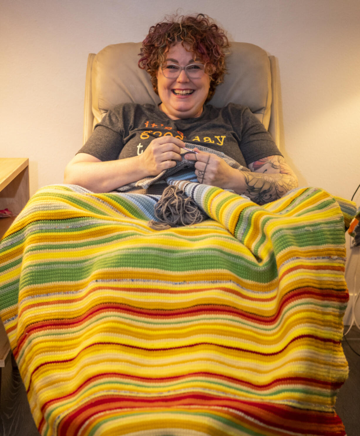 Her grandchild will know she's the coolest -- and the warmest. Jene McMahon of Hazel Dell beams over the temperature blanket she's been crocheting all year. Every colored line in the blanket signals the high temperature for a single day. Yellows and reds mean warm and hot days.