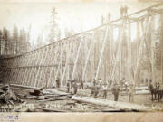 Bridge workers pose for a photo during the construction of Burnt Bridge Creek rail bridge in 1904. The stream's namesake seems to derive from two bridges that burned about 40 years apart. Both were about 2 1/2 miles north of Fort Vancouver. Hudson Bay Company built the first one to move livestock and agricultural goods across the creek, separating pastures and agricultural land from Fort Vancouver.