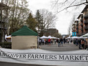 Visitors browse at the Vancouver Farmers Market on March 26.