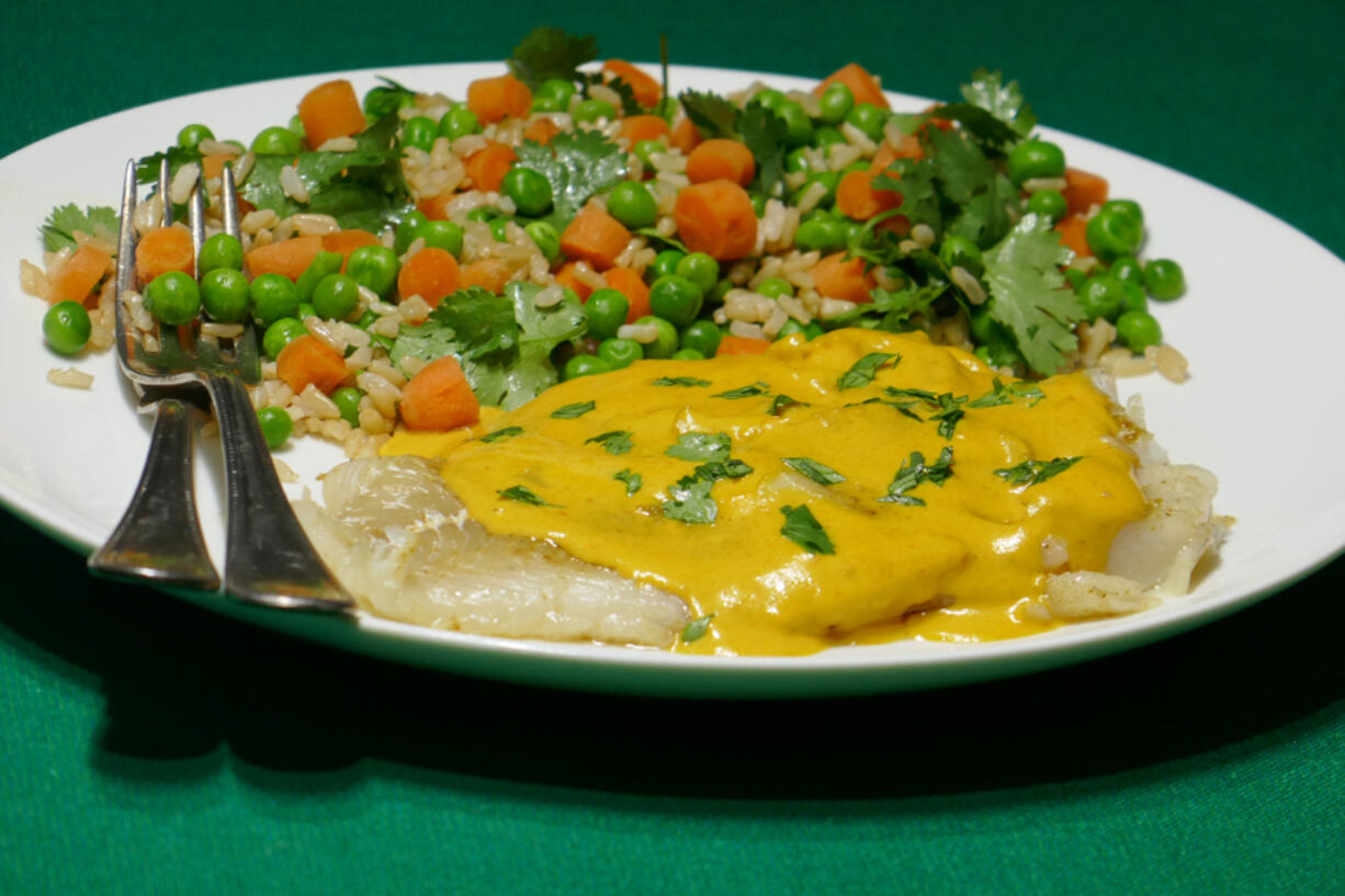 Pan-Fried Cod With Amarillo Sauce and Cilantro Rice.