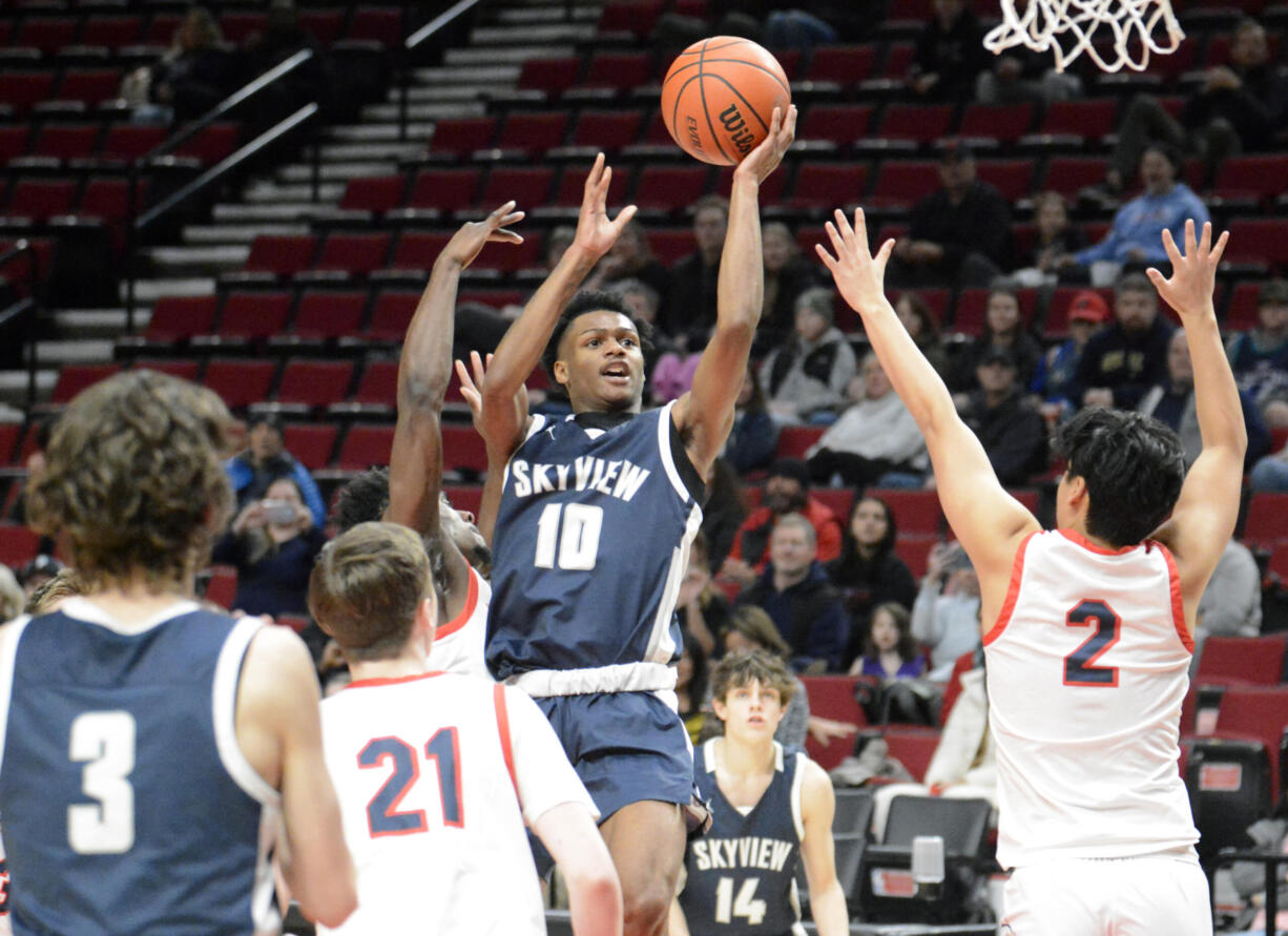 Skyview’s Demaree Collins flips a layup over multiple Westview defenders at the “Court Of Dreams” high school basketball showcase held at the Moda Center on Saturday, Dec. 17, 2022, in Portland.