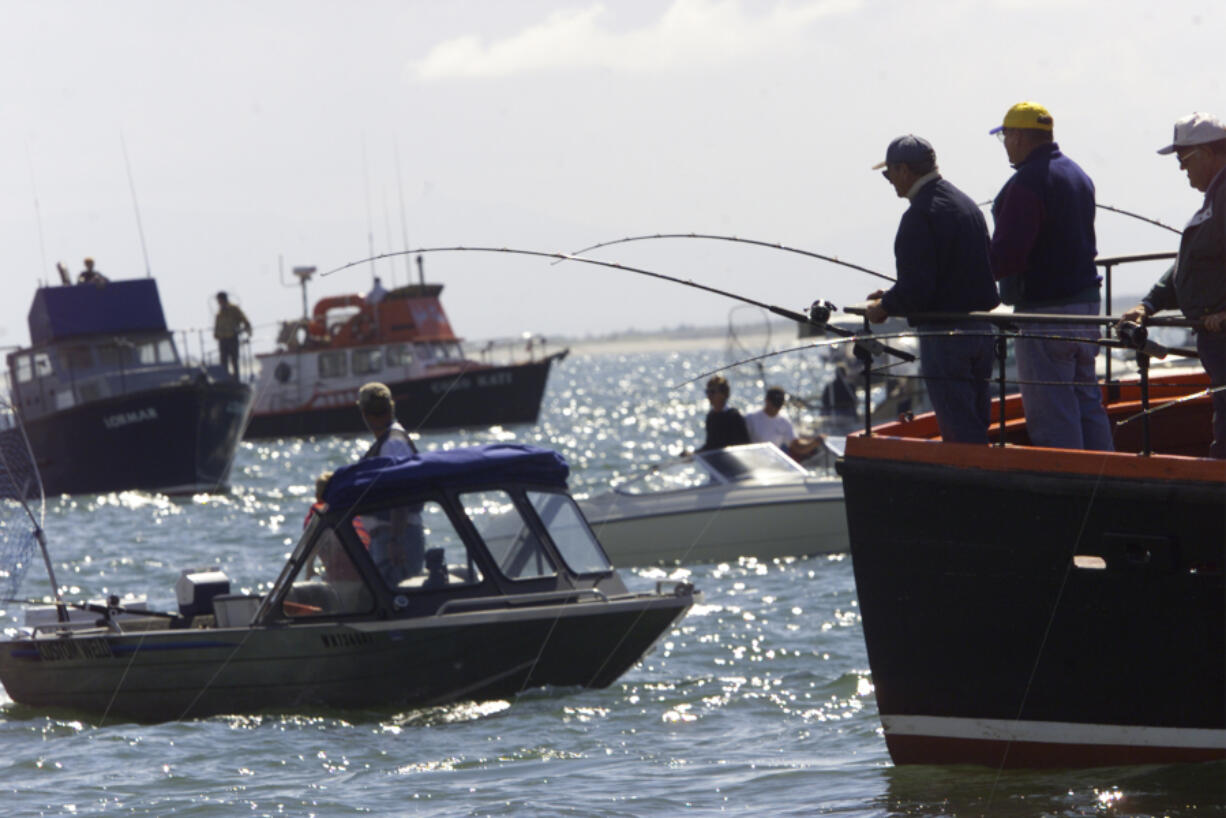 August 15, 2000 -- Jeremiah Coughlan -- Dozens of boats patrol the waters off Buoy 10 in the Columbia River as salmon season at the mouth of the river starts today.