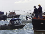 August 15, 2000 -- Jeremiah Coughlan -- Dozens of boats patrol the waters off Buoy 10 in the Columbia River as salmon season at the mouth of the river starts today.