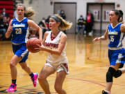 Molly Malone (1) and her Fort Vancouver teammates are among four girls basketball teams and 16 boys teams in the Fort Vancouver Holiday Classic this week in Vancouver.