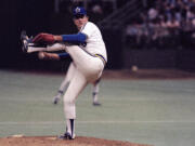 Seattle Mariners pitcher Gaylord Perry throws in his 300th Major League victory, a 7-3 win over the New York Yankees in Seattle, May 6, 1982. Baseball Hall of Famer and two-time Cy Young winner Gaylord Perry, a master of the spitball, died Thursday, Dec. 1, 2022, at his home in Gaffney, S.C. He was 84.