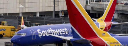 Southwest Airlines' aircrafts parked on the tarmac of LaGuardia Airport, Tuesday, Dec. 27, 2022, in New York. The U.S. Department of Transportation says it will look into flight cancellations by Southwest Airlines that have left travelers stranded at airports across the country amid an intense winter storm.