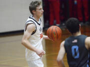 Battle Ground's Ty Robertson brings the ball upcourt during the Tigers' 88-68 win over Liberty (Ore.) at the Fort Vancouver Holiday Classic on Wednesday, Dec. 28, 2022.