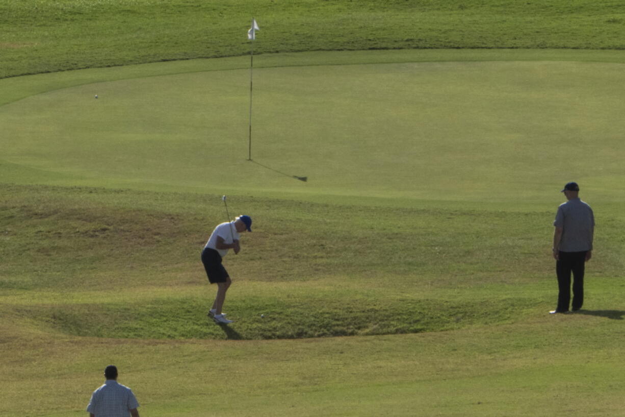 President Joe Biden plays golf at The Buccaneer in Christiansted, U.S. Virgin Islands, Friday, Dec. 30, 2022.