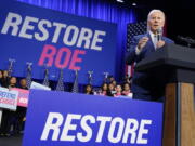 FILE - President Joe Biden speaks about abortion access during a Democratic National Committee event at the Howard Theatre, Oct. 18, 2022, in Washington. The Biden administration is still actively searching for ways to safeguard abortion access for millions of women, even as it bumps up against a complex web of strict new state laws enacted in the months after the Supreme Court stripped the constitutional right.