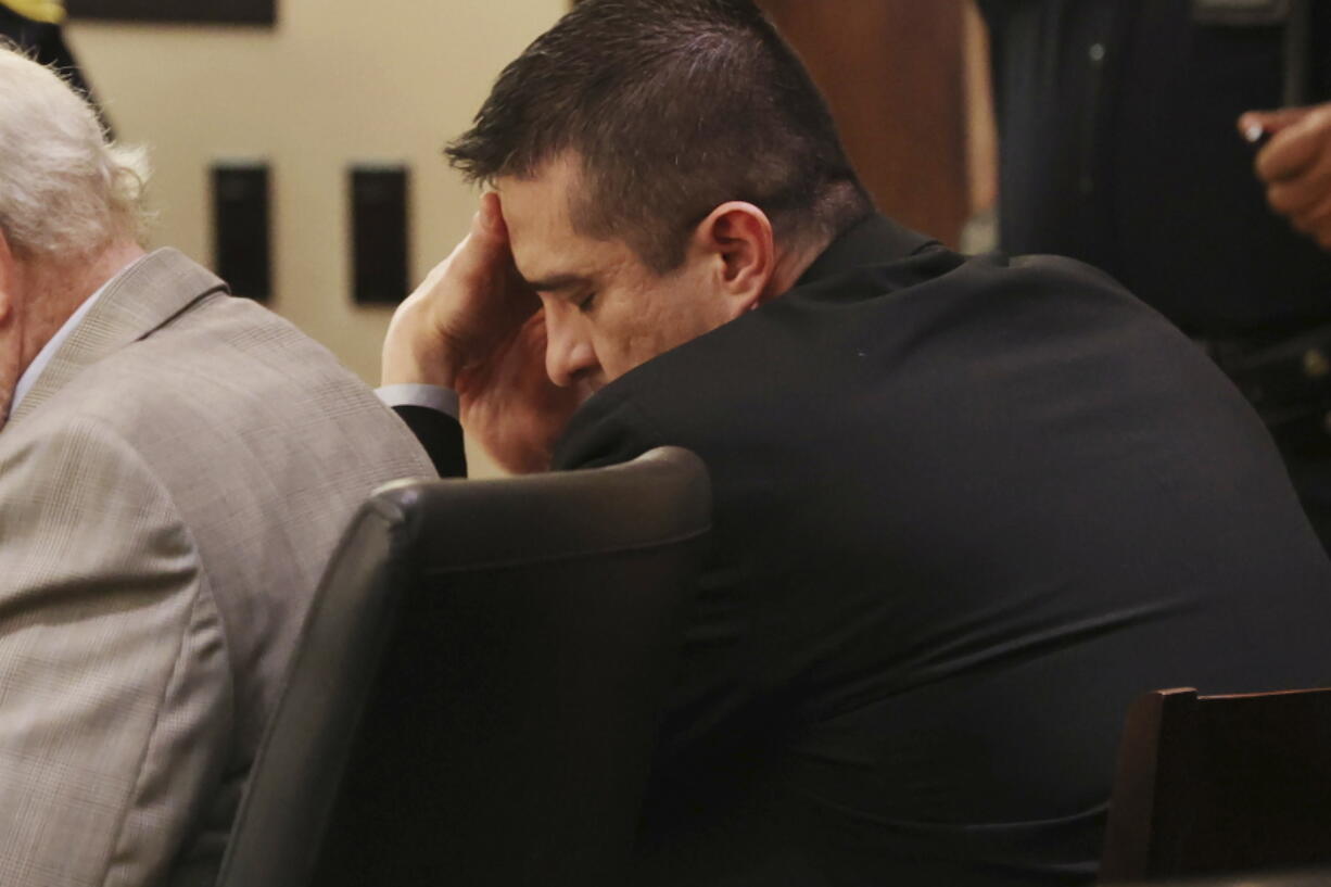 Former U.S. Border Patrol supervisor Juan David Ortiz reacts as recorder jail phone calls to his wife, Daniella, are played outside the presence of the jury during his capital murder trial at the Cadena-Reeves Justice Center in San Antonio, Texas, Tuesday, Dec. 6, 2022.