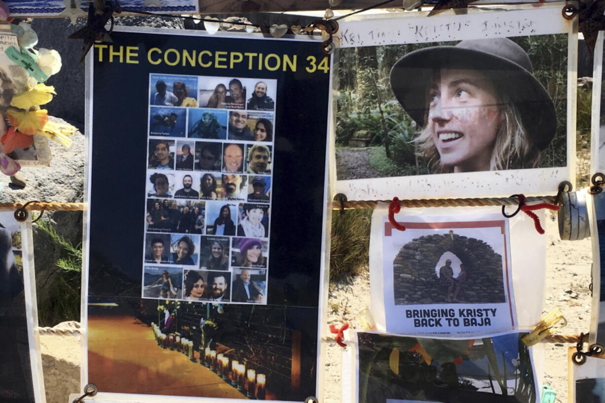 FILE - This July 12, 2020, photo shows a standing memorial to the people who died aboard the Conception dive boat is seen along the coast near the Santa Barbara, Calif., harbor. Federal lawmakers have changed 19th century maritime liability rules for accident victims and their families in response to the 2019 boat fire off the coast of Southern California that killed 34 people. President Joe Biden signed an $858 billion defense spending bill on Friday, Dec. 23, 2022, which included the Small Passenger Vessel Liability Fairness Act.