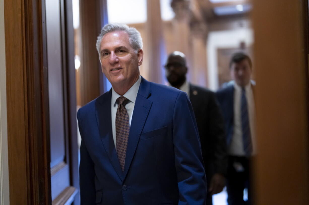 FILE - Nancy Pelosi of California takes the gavel from House Minority Leader Kevin McCarthy, R-Calif., after being elected House Speaker at the Capitol in Washington, Jan. 3, 2019.