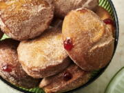 A plate of jelly doughnuts are displayed in New York on Nov. 15, 2021. In Jewish homes, jelly doughnuts are often enjoyed during Hanukkah and are known as Sufganiyot.