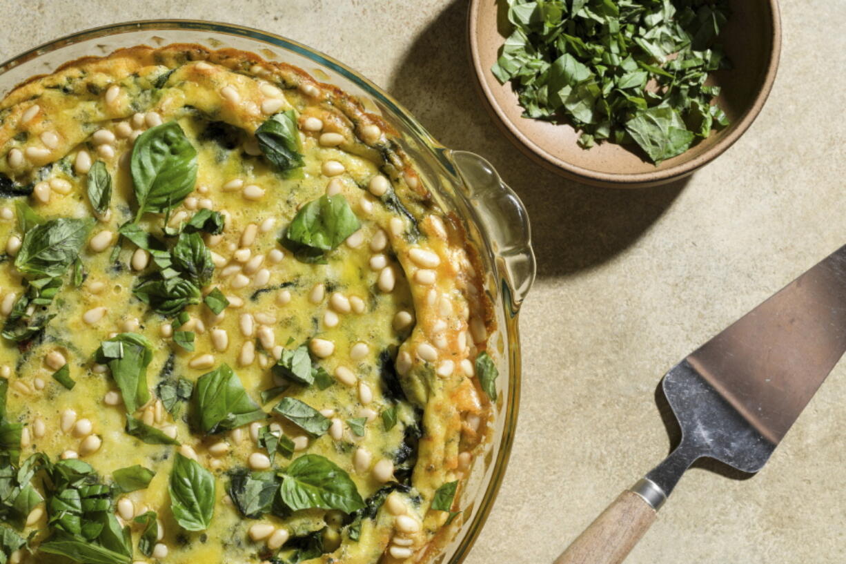 A recipe for Baked Eggs with Potatoes and Spinach.