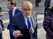 Former New York City mayor Rudy Giuliani speaks to reporters after a court hearing, Monday, Dec. 12, 2022, in New York. Rudy Giuliani beat a contempt order and avoided jail in an ongoing dispute over money he owes to his ex-wife, Judith Giuliani, as part of their 2019 divorce settlement.