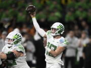 Oregon quarterback Bo Nix (10) passes during the first half of the Holiday Bowl NCAA college football game against North Carolina Wednesday, Dec. 28, 2022, in San Diego.